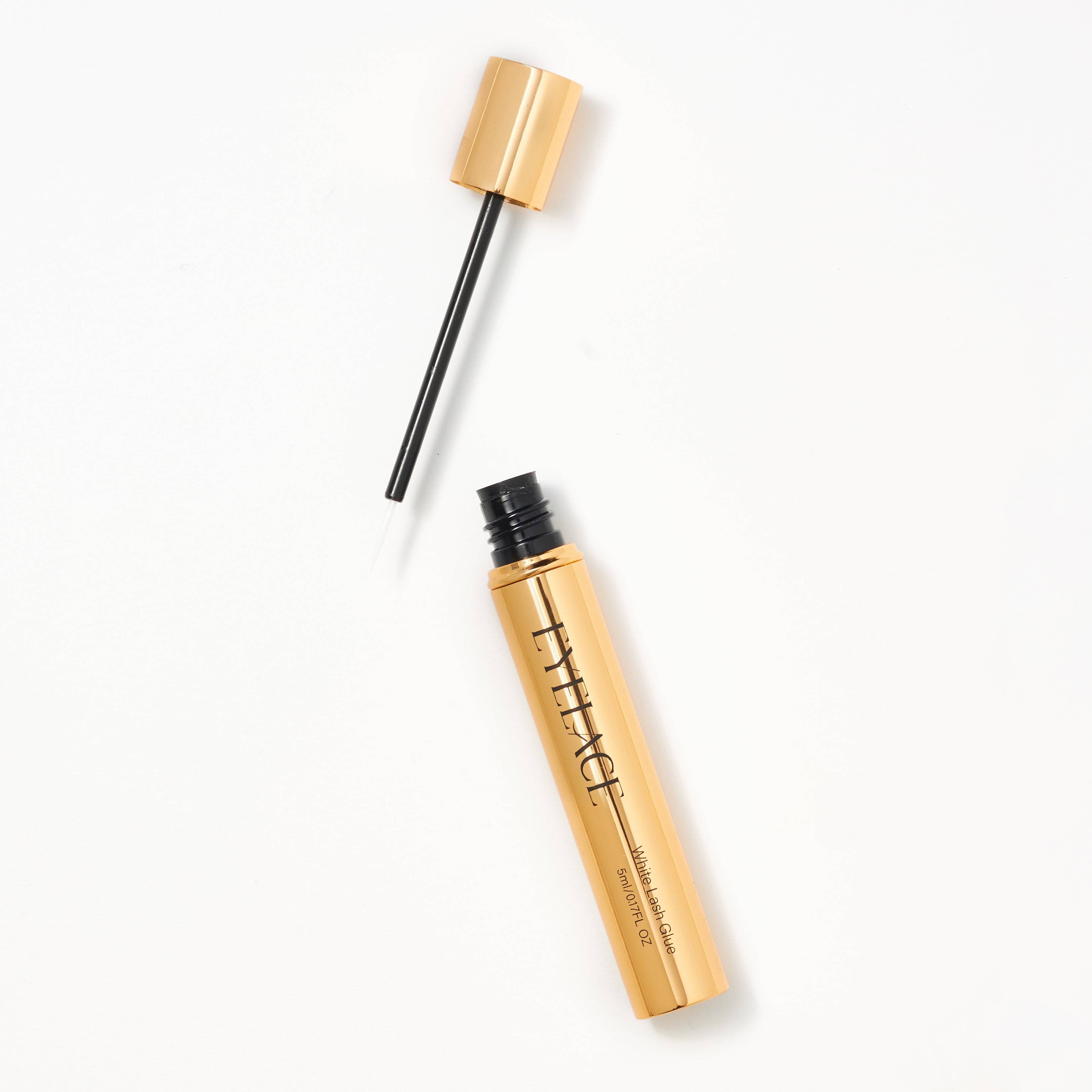 Open Eyelace White Lash Glue with applicator on white background