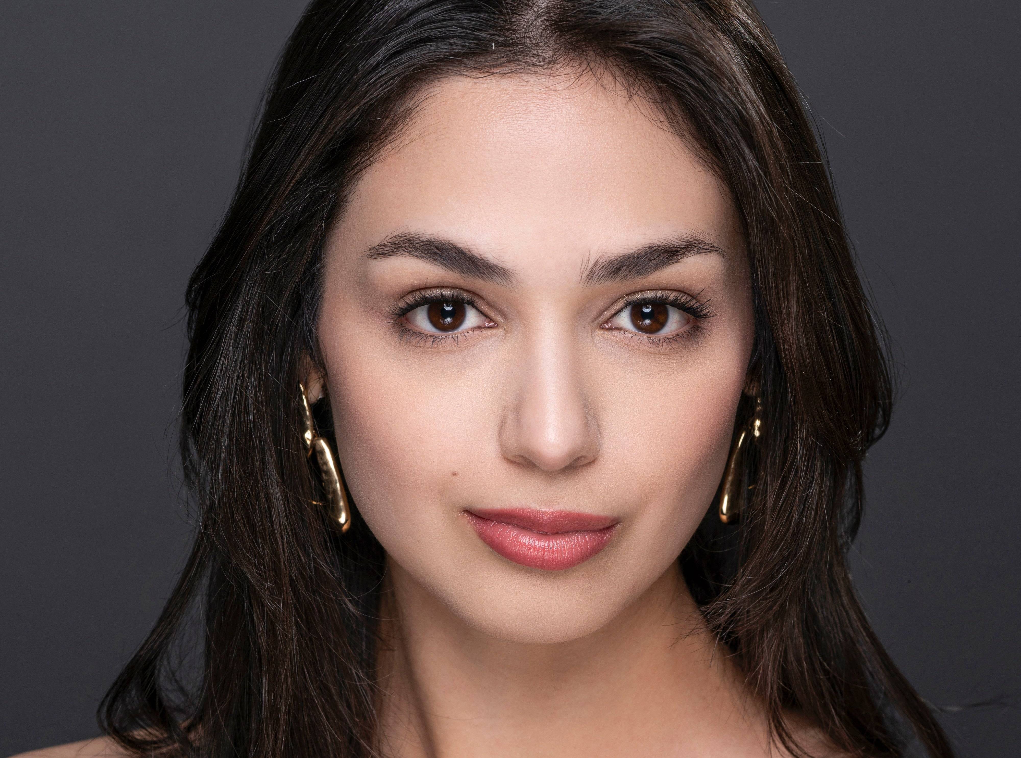 Model facing forward wearing Natural Beauty Lashes