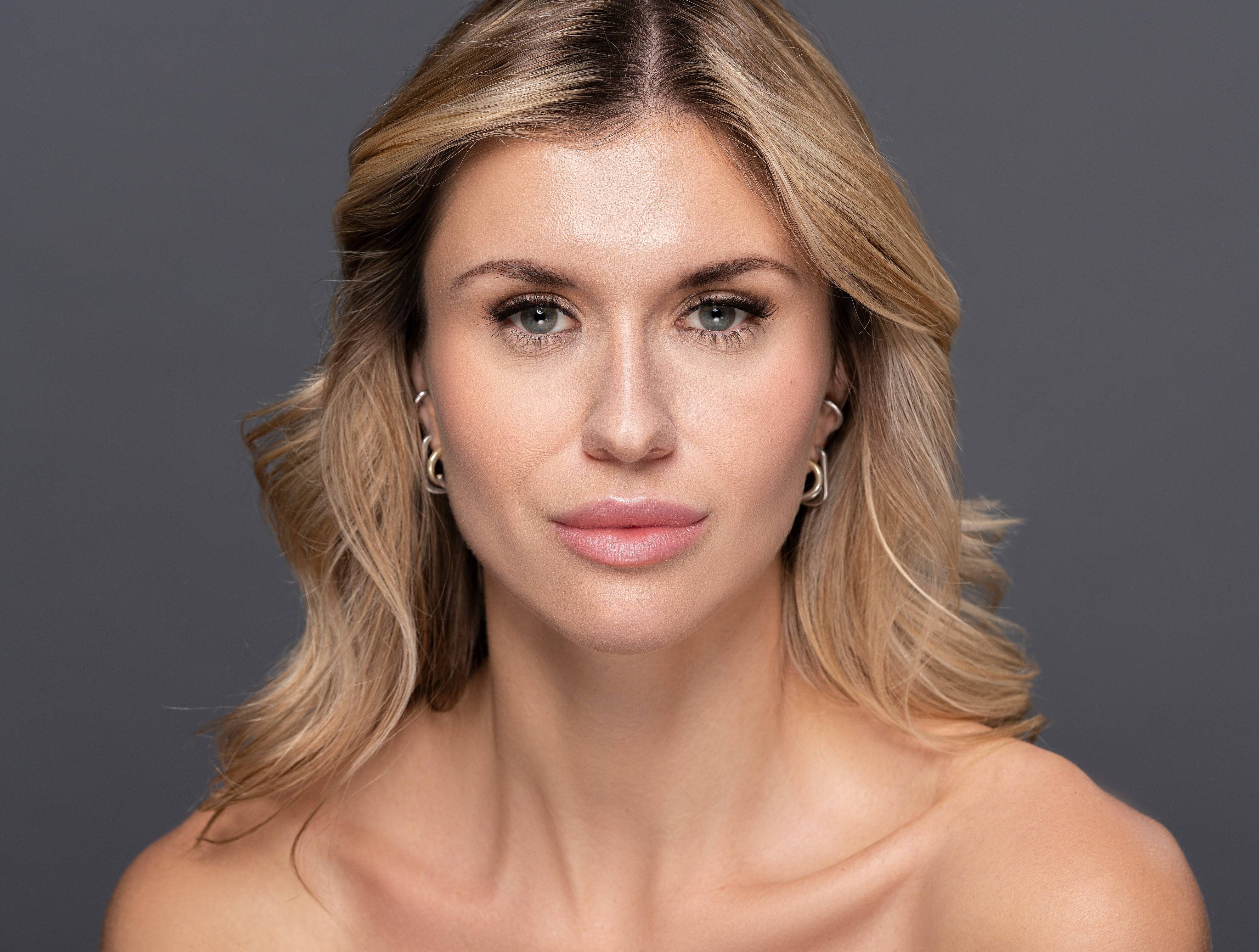Blonde woman wearing Perfect Poise Lashes