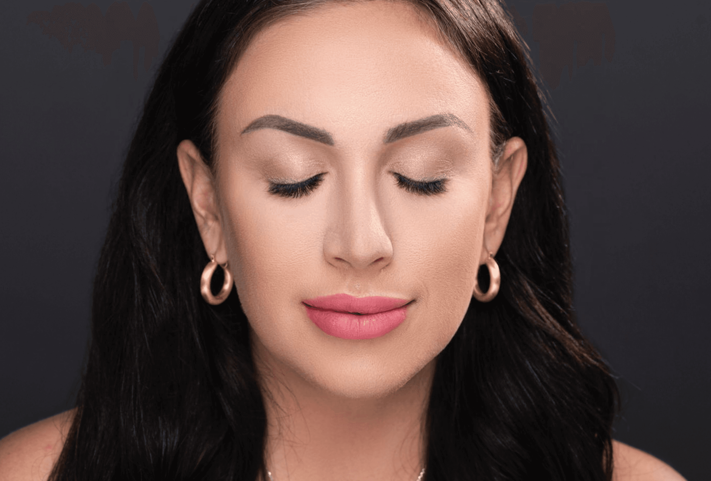 Woman with closed eyes wearing Perfect Poise Lashes