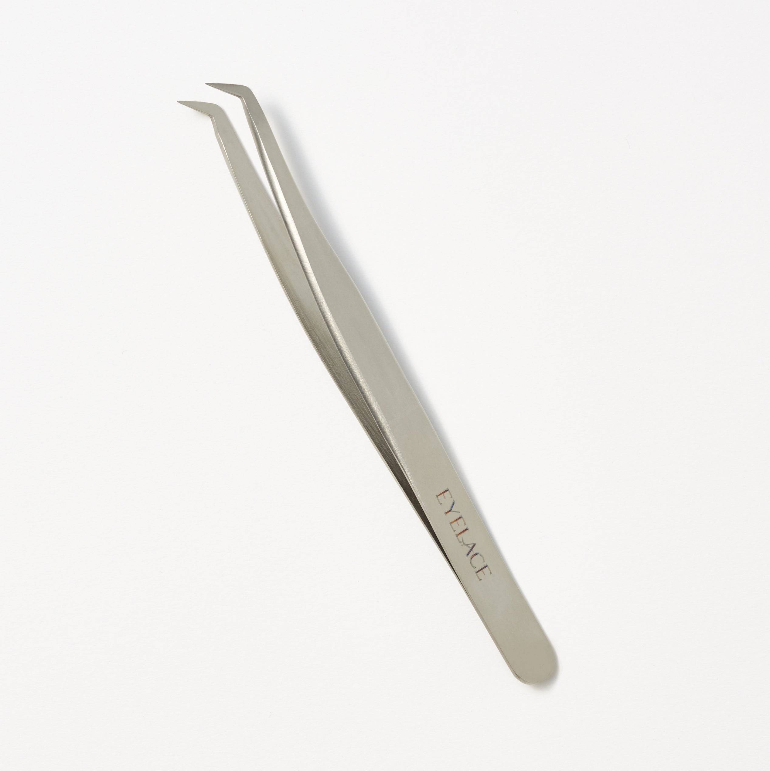 Eyelace tweezers with beak tip on white background